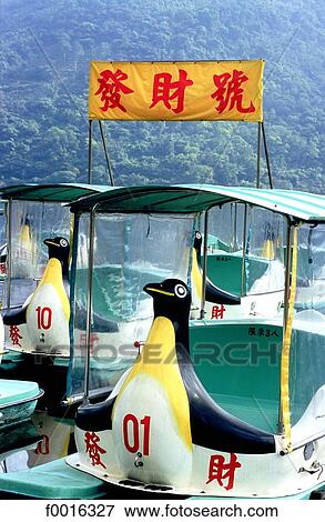 Stock Photo - China, Taiwan, near Hualien, lake Li Yu, pedal boats. Fotosearch