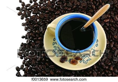 Cup and coffee beans View Large Photo Image Stock Photo - Cup and coffee beans. Fotosearch