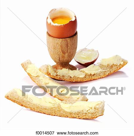 Boiled egg and bread View Large Photo Image Stock Photo - Boiled egg and bread. Fotosearch