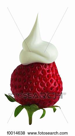 Stock Photo - Strawberry with sour cream. Fotosearch