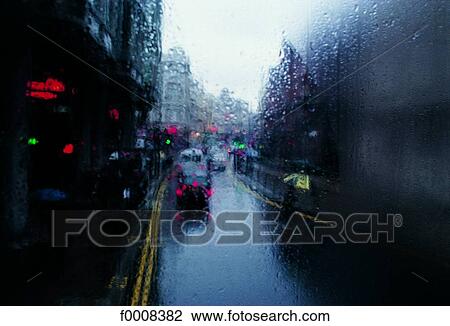 London, Looking at the street out of a bus window, rainy weather View Large Photo Image Stock Image - London, Looking at the street out of a bus window, rainy weather . Fotosearch