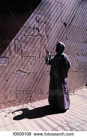 Stock Photo - Egypt, Abydos temple, guide. Fotosearch