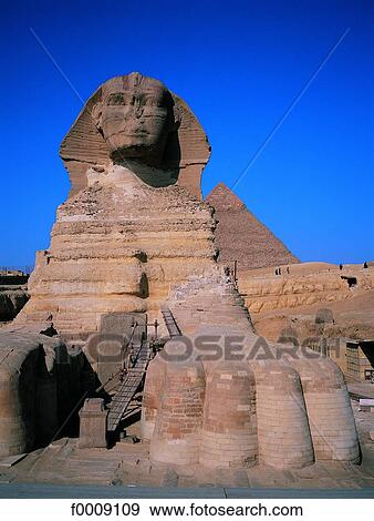 Egypt, Cairo, Giza, Sphinx and pyramid of Cheops View Large Photo Image Stock Photo - Egypt, Cairo, Giza, Sphinx and pyramid of Cheops. Fotosearch