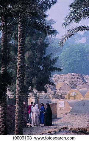 Egypt, Fayum Oasis, mourning women in front of the cemetry View Large Photo Image Stock Image - Egypt, Fayum Oasis, mourning women in front of the cemetry. Fotosearch
