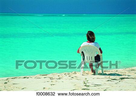 Stock Image - Virgin Islands, woman looking at the sea. Fotosearch
