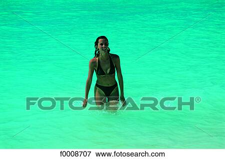 Stock Photo - Virgin Islands, young woman bathing. Fotosearch