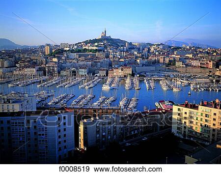 Stock Photo - France, Marseilles, Overview on Vieux-Port and city. Fotosearch