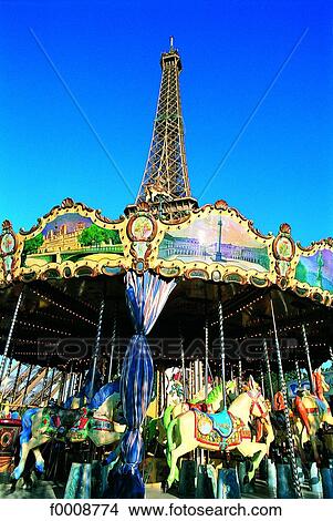 France, Paris, Merry-go-round at the Eiffel Tower View Large Photo Image Picture - France, Paris, Merry-go-round at the Eiffel Tower. Fotosearch