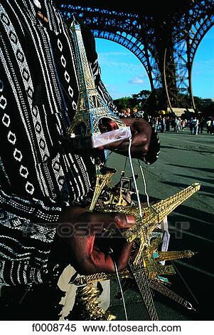Stock Photography - France, Paris, Souvenir stalls under the Eiffel Tower. Fotosearch