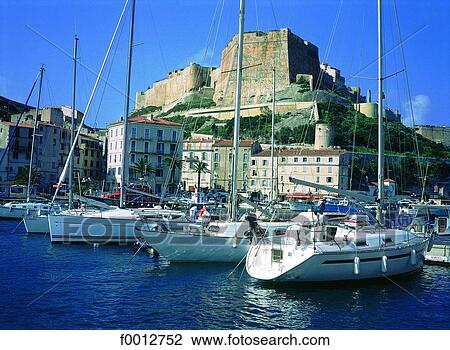 Stock Image - Corsica, Bonifacio, harbour and Citadel. Fotosearch