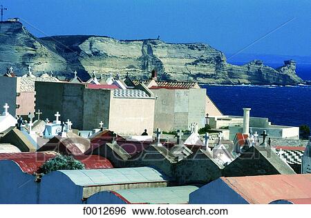 Stock Photograph - Corsica, Bonifacio, the cliffs and the maritime cemetery at fore. Fotosearch