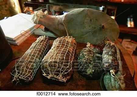 Picture - Corsica, Evisa village, charcuterie made with local pigs. Fotosearch