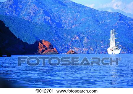 Corsica, Piana vicinity, Porto golf, large cruiser anchored View Large Photo Image Stock Image - Corsica, Piana vicinity, Porto golf, large cruiser anchored. Fotosearch