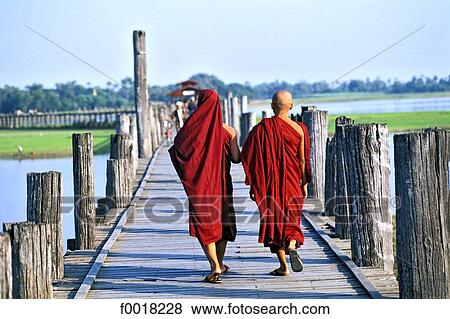 Myanmar, Mandalay, Thaungthaman lake, bonzes on U Bein bridge View Large Photo Image Stock Photo - Myanmar, Mandalay, Thaungthaman lake, bonzes on U Bein bridge. Fotosearch