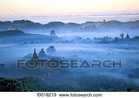 Myanmar, Rakhine state, Mrauk U, hills at dusk View Large Photo Image Stock Photo - Myanmar, Rakhine state, Mrauk U, hills at dusk. Fotosearch