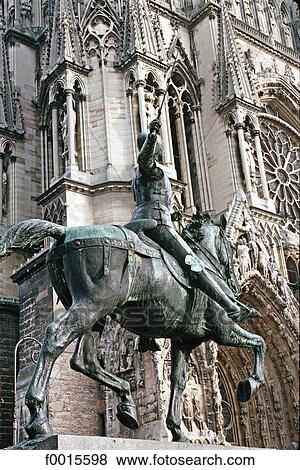 France, Champagne region, Reims, statue of Joan of Arc in front of the cathedral View Large Photo Image Stock Photo - France, Champagne region, Reims, statue of Joan of Arc in front of the cathedral. Fotosearch
