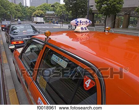 Stock Image - Japan, Tokyo, Ginza, taxi. Fotosearch