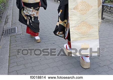 Picture - Japan, Kyoto, Maikos walking to their appointments in Pontocho traditional quarter. Fotosearch