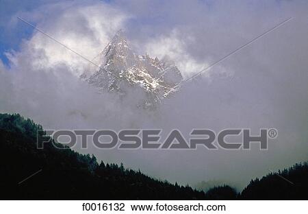 France, Alps, Chamonix valley, Mont Blanc surrounded by clouds View Large Photo Image Stock Image - France, Alps, Chamonix valley, Mont Blanc surrounded by clouds. Fotosearch