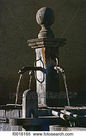 Stock Photography - France, Alps, St Veran, fountain. Fotosearch
