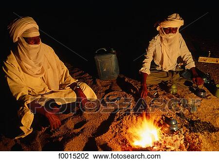 Algeria, Hoggar, Tuareg making tea View Large Photo Image Stock Image - Algeria, Hoggar, Tuareg making tea. Fotosearch