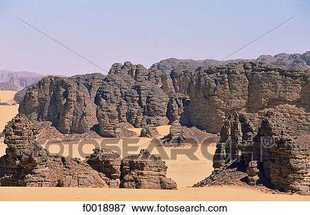 Algeria, Tassili n'Ajjer, sand and rocks View Large Photo Image Stock Photo - Algeria, Tassili n'Ajjer, sand and rocks. Fotosearch