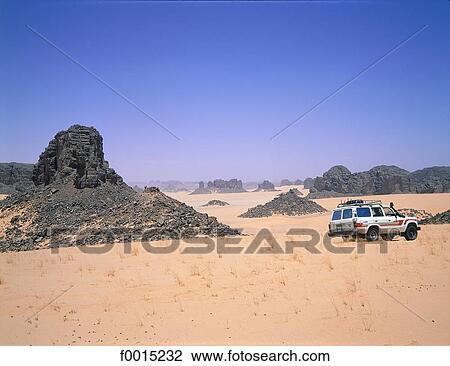 Algeria, Tassili n'Ajjer, sand dune and rocks View Large Photo Image Stock Image - Algeria, Tassili n'Ajjer, sand dune and rocks. Fotosearch