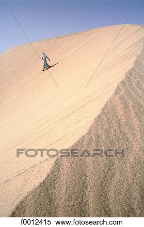 Stock Photography - Algeria, Tassili n'Ajjer, sand dune, Tuareg. Fotosearch