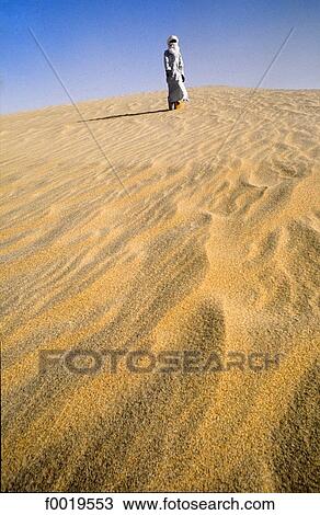 Algeria, Tassili n'Ajjer, sand dunes, Tuareg View Large Photo Image Stock Image - Algeria, Tassili n'Ajjer, sand dunes, Tuareg. Fotosearch