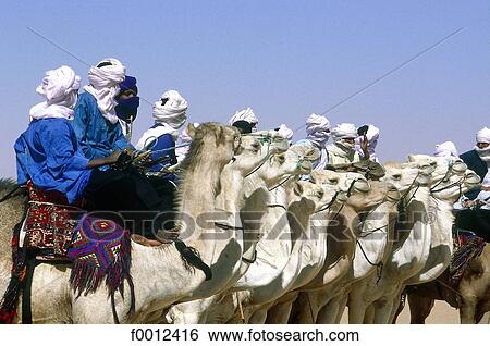 Algeria, Tassili n'Ajjer, Tuareg festival, camel race View Large Photo Image Stock Photograph - Algeria, Tassili n'Ajjer, Tuareg festival, camel race. Fotosearch