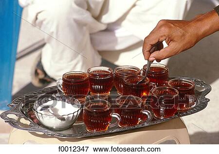 Stock Photo - Algeria, tea in the desert. Fotosearch
