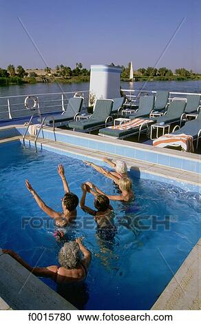 Egypt, cruise on river Nile, gymnastics in the swimming pool View Large Photo Image Stock Image - Egypt, cruise on river Nile, gymnastics in the swimming pool. Fotosearch