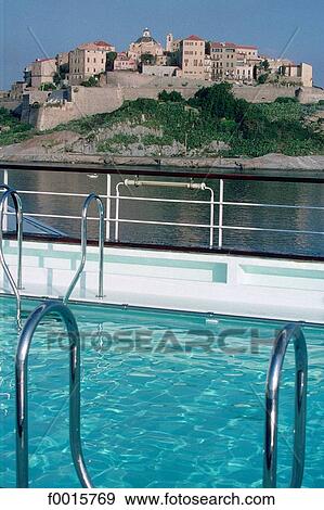 France, corsica, cruising near Calvi, swimming pool on board View Large Photo Image Stock Photo - France, corsica, cruising near Calvi, swimming pool on board. Fotosearch
