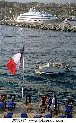 French riviera, boat in Cannes harbour View Large Photo Image Stock Image - French riviera, boat in Cannes harbour. Fotosearch