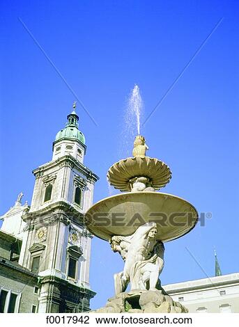 Stock Image - Austria, Salzburg, Residenzplatz, fountain. Fotosearch