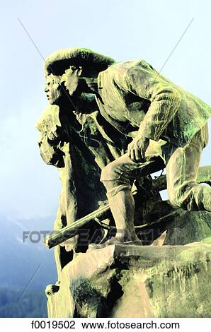 Stock Image - Austria, Tyrol, Innsbruck, wood-carved Tyrolean. Fotosearch