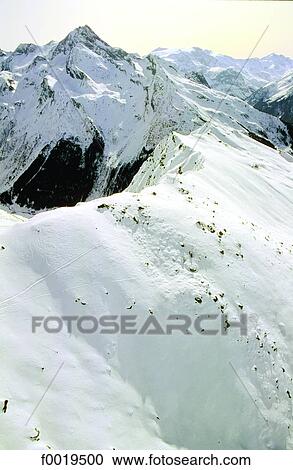 Stock Image - Austria, Tyrol, snowy mountains. Fotosearch