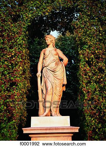 Stock Image - Austria, Vienna, Schonbrunn castle, statue in the park. Fotosearch