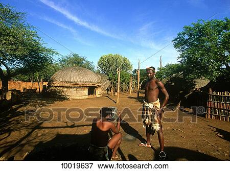 Stock Photo - South Africa, drinking Zulu beer. Fotosearch