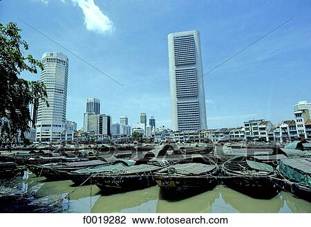 Singapore city, boats and buildings View Large Photo Image Stock Image - Singapore city, boats and buildings. Fotosearch