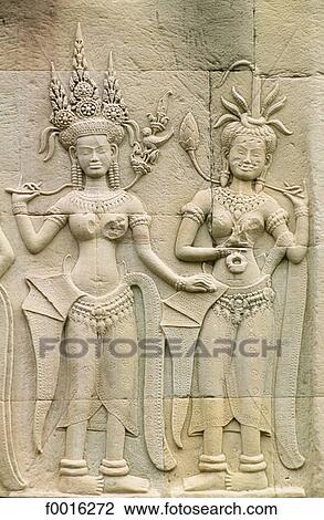 Stock Image - Cambodia, Angkor Wat, carved Devatas. Fotosearch