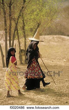 Yemen, Wadi Hadramawt, shepherdesses View Large Photo Image Stock Photograph - Yemen, Wadi Hadramawt, shepherdesses. Fotosearch