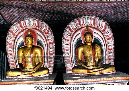 Picture - Sri Lanka, Dambulla, two Buddhas. Fotosearch