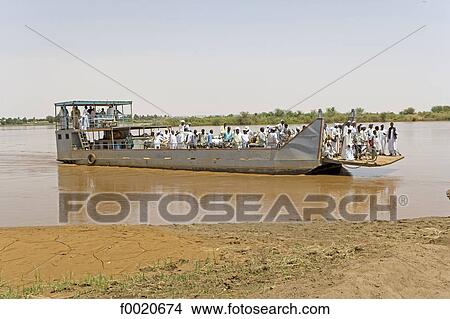 Picture - Sudan, Atbara, ferry on the river Nile. Fotosearch