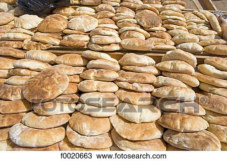 Sudan, Karima, bread on sale at the market View Large Photo Image Stock Image - Sudan, Karima, bread on sale at the market. Fotosearch