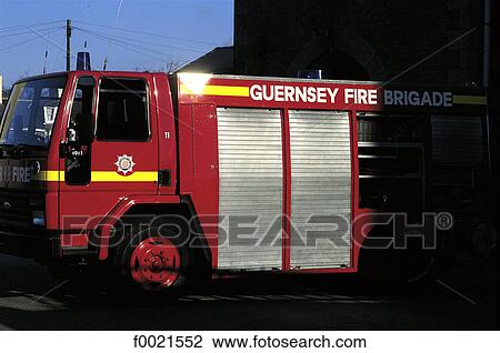 Stock Image - Channel Islands, Guernsey, Firemen truck. Fotosearch
