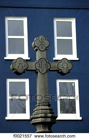 Stock Photo - Channel Islands, Guernsey, St Peter Port, cross and facade. Fotosearch