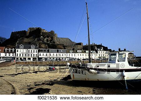 Channel Islands, Jersey, boat on the beach View Large Photo Image Stock Photography - Channel Islands, Jersey, boat on the beach. Fotosearch