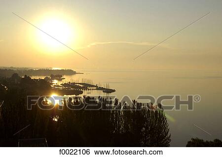 Stock Photograph - Hungary, Lake Balaton, sunset. Fotosearch
