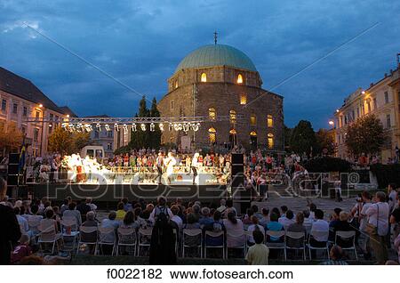 Hungary, Pécs, Széchenyi tér by night, show in front of the church-mosque View Large Photo Image Stock Image - Hungary, Pécs, Széchenyi tér by night, show in front of the church-mosque. Fotosearch